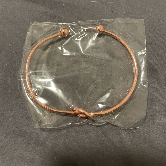 rose gold tone adjustable bangle bracelet with round knot - Picture 5 of 6